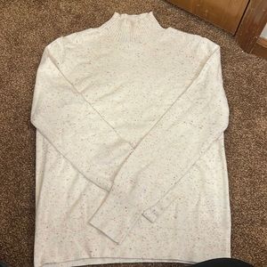 Soft turtle neck cream with multi color flecks! Never worn - Medium.